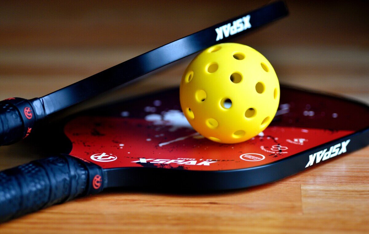Pickleball with paddles