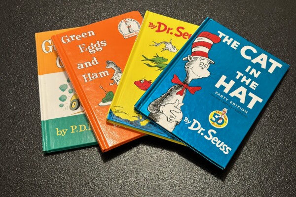 Dr. Seuss books on a table.