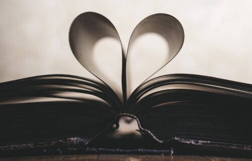 Romance novels: Book with pages folded into a heart