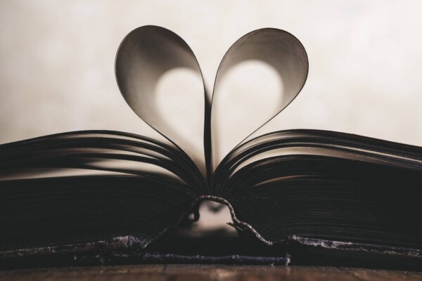 Romance novels: Book with pages folded into a heart