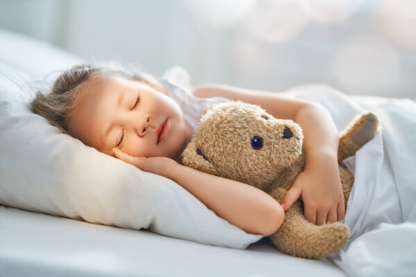 Child sleeping in bed