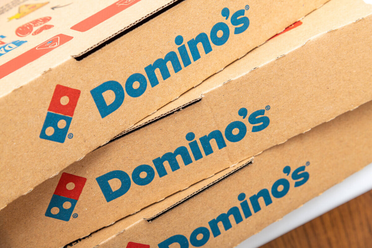 Domino’s Pizza boxes in a pile