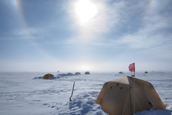 A research camp on the Antarctic ice sheet during daytime