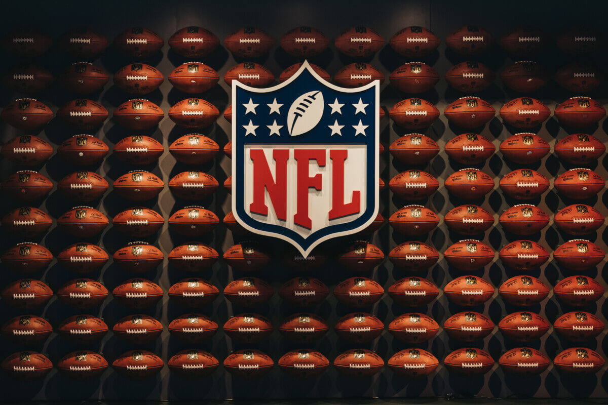 Rows of NFL football balls in NFL Experience in Times Squar