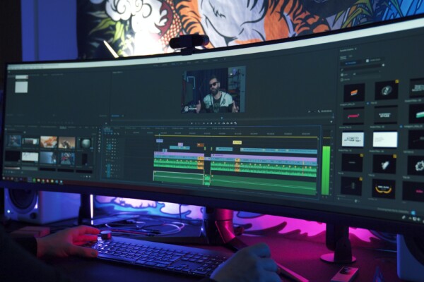 Man editing video at computer