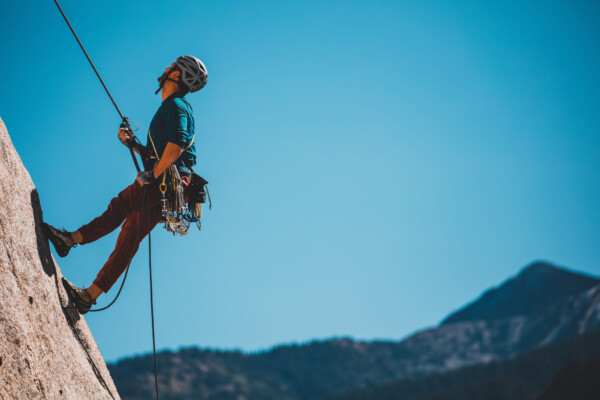 a man rock climbing