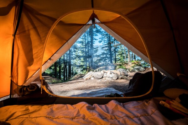 Camping in a tent in the wilderness