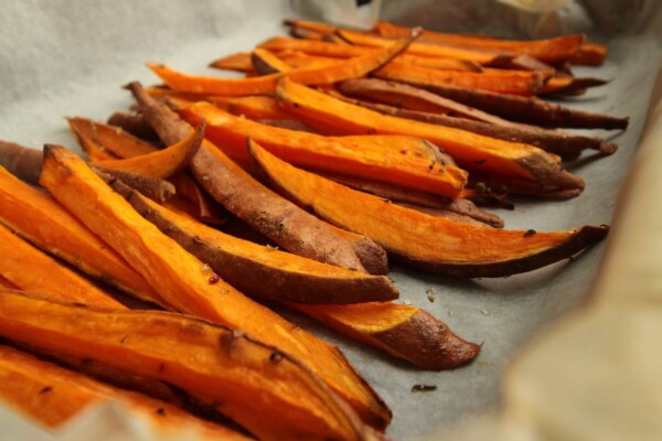 sliced sweet potatoes on white table
