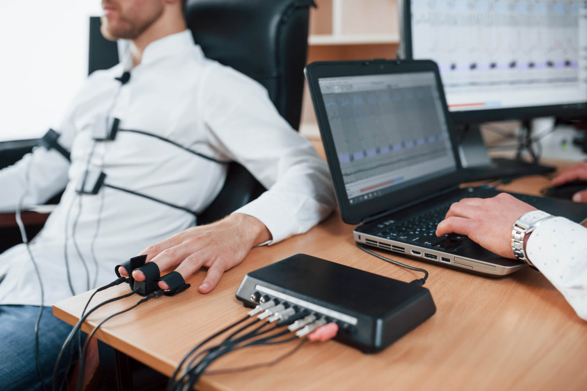 Person taking a polygraph test