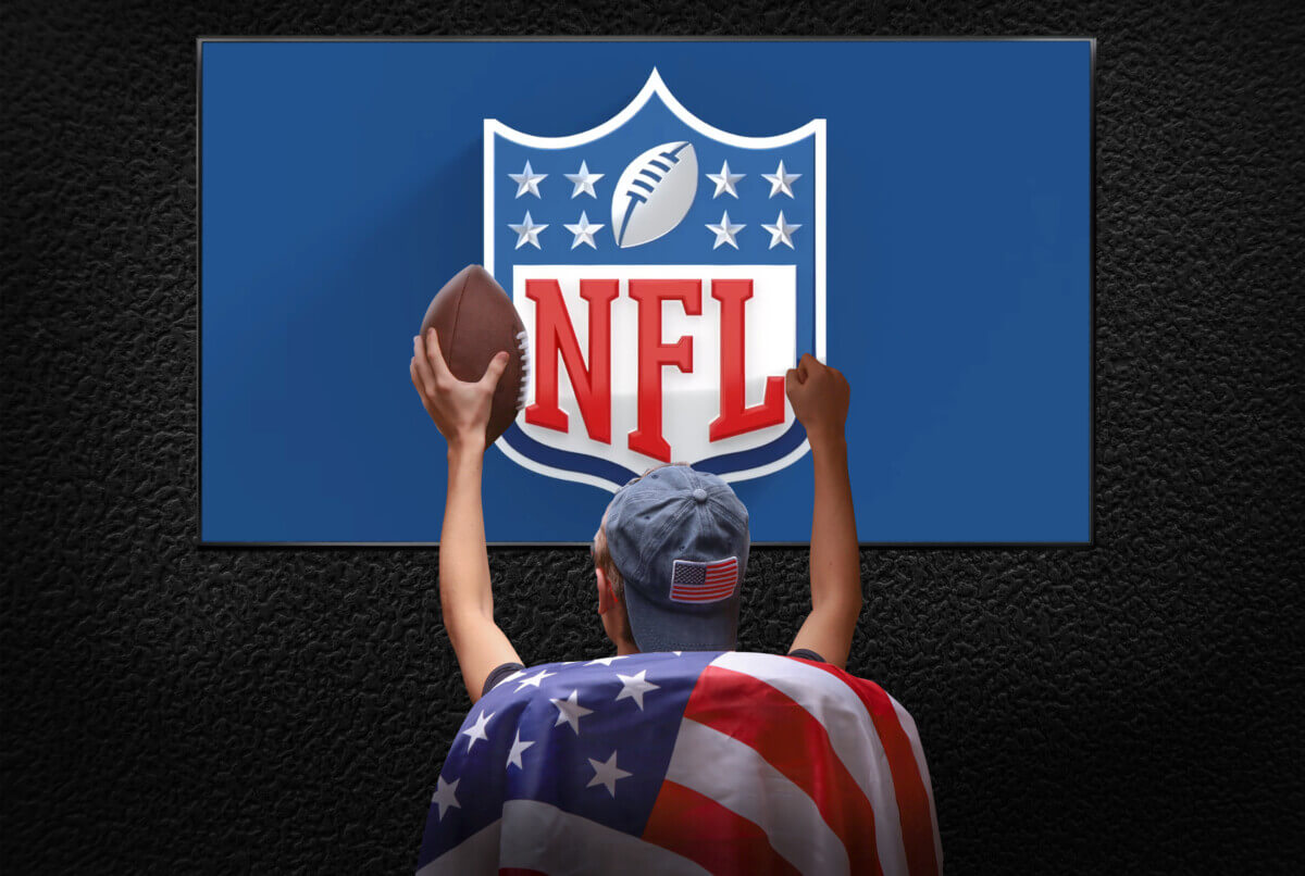 NFL fan watching football on TV