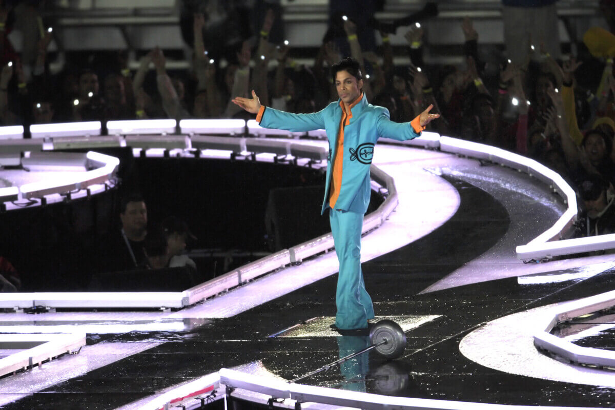 Prince gestures as he performs during half-time for Super Bowl XLI between the Chicago Bears and the Indianapolis Colts at Dolphin Stadium on February 4, 2007 in Miami.