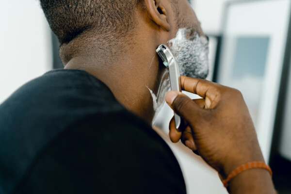 A man shaving his face