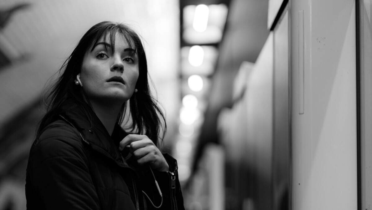 Woman listening to a podcast