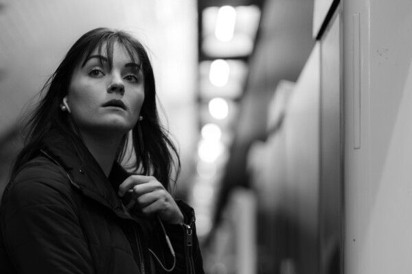 Woman listening to a podcast