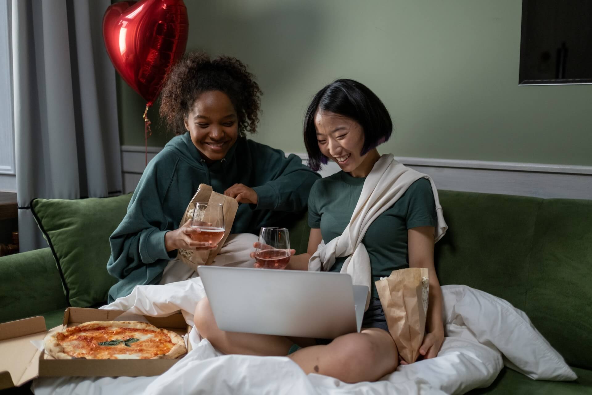 couple eating and watching valentines day movie 