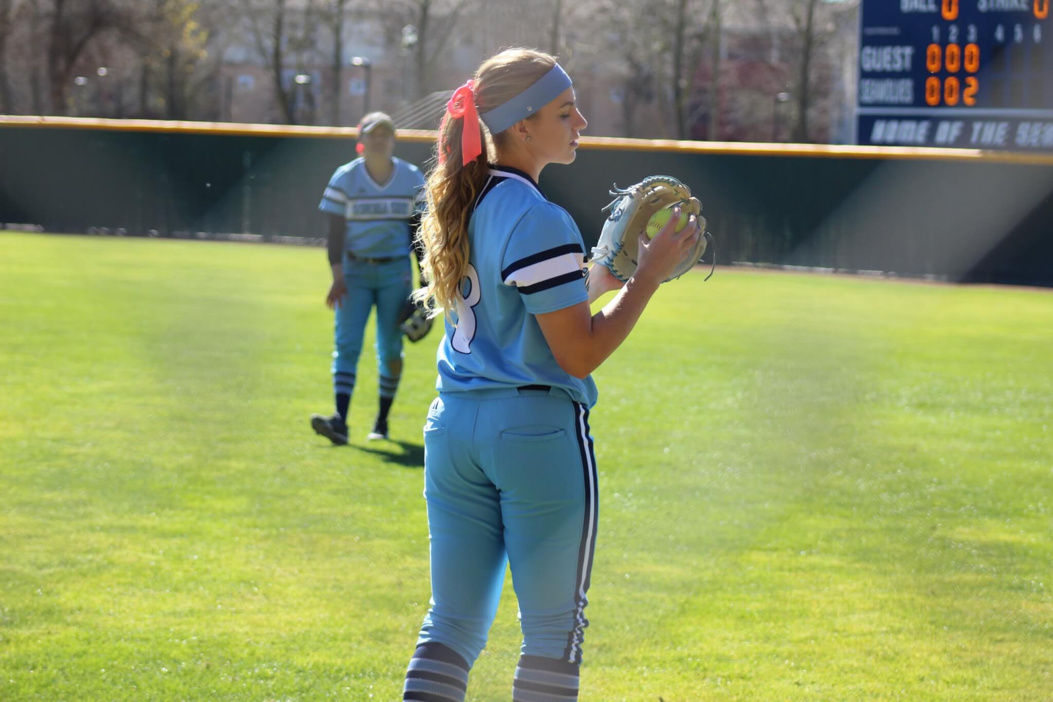 Softball players having a catch