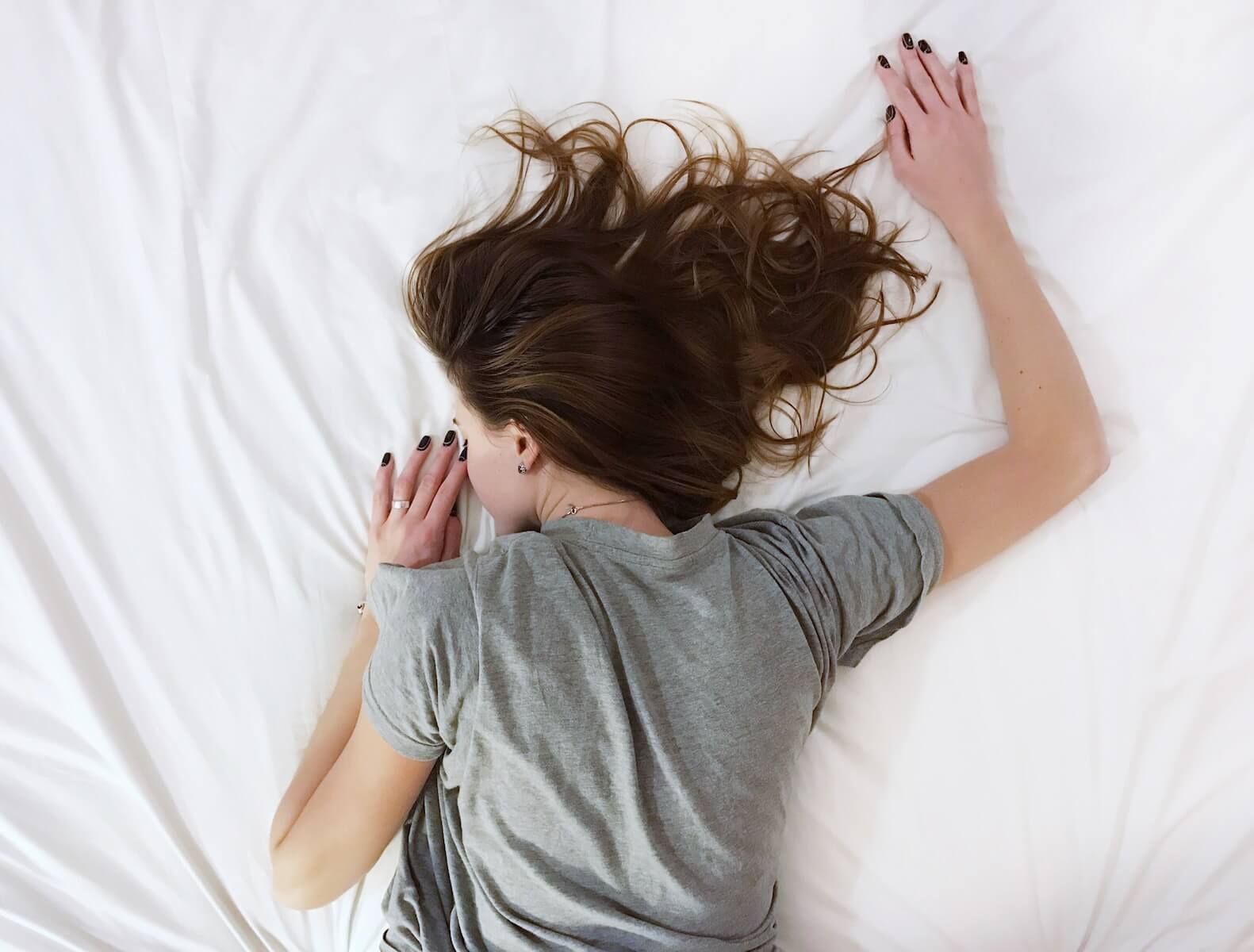 woman sleeping on her stomach