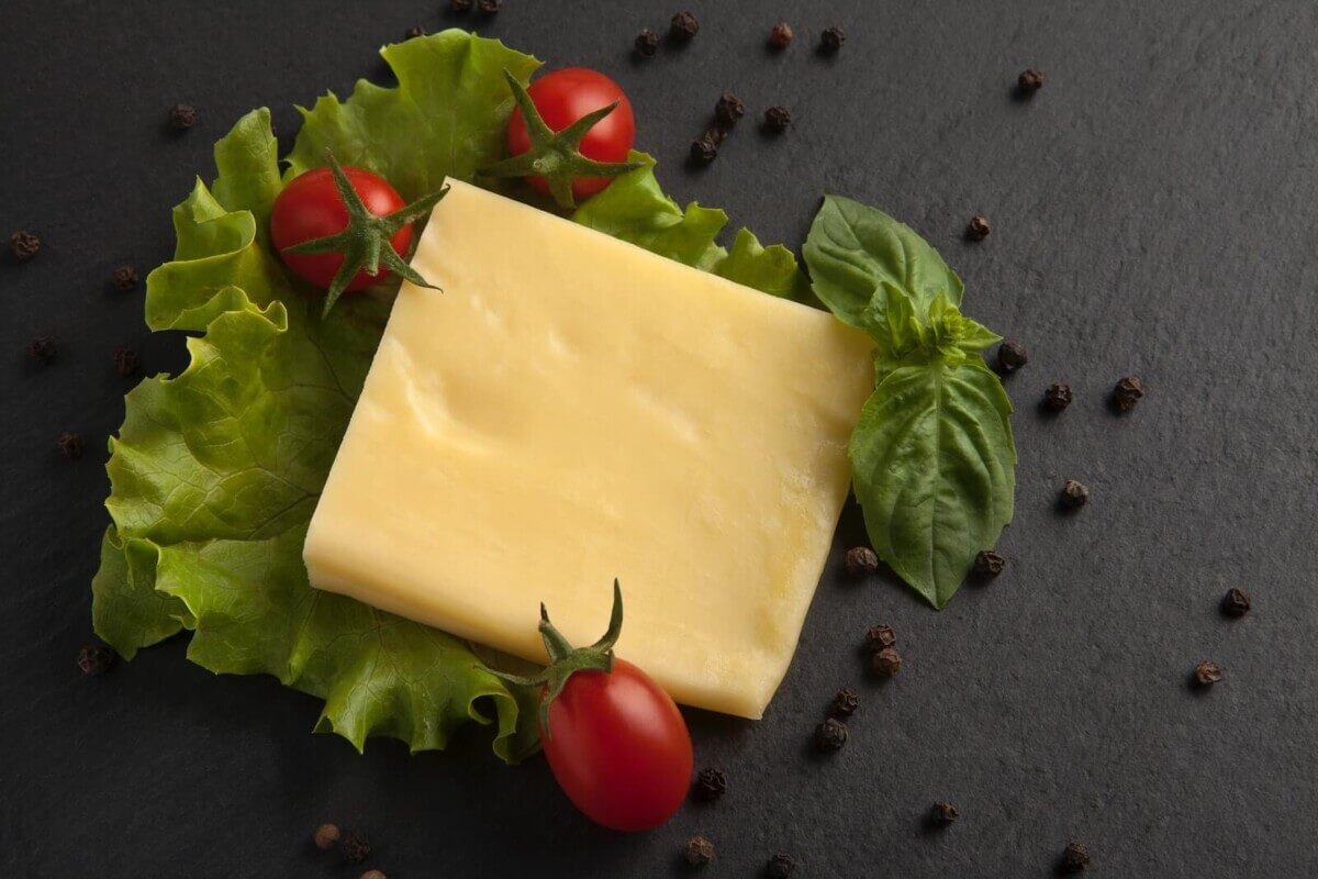 cheddar cheese, greens and tomatoes