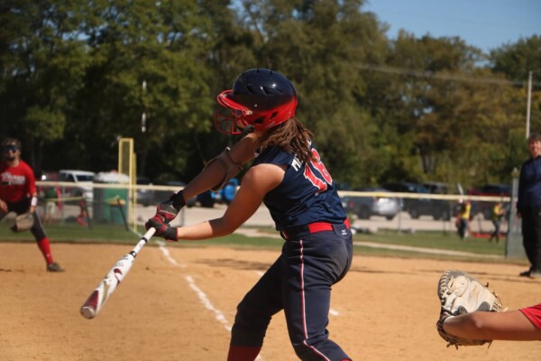 softball player wearing a batting helmet