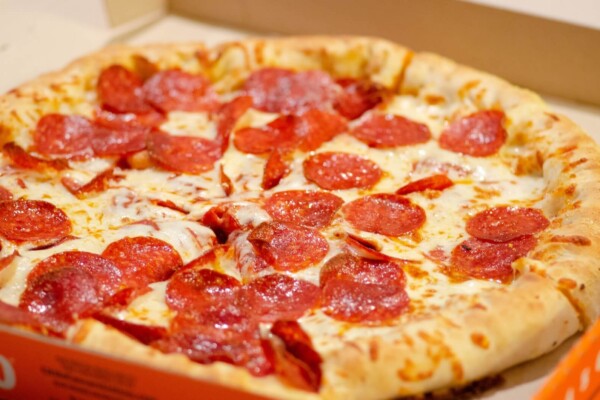 Baked pepperoni pizza with thick crust