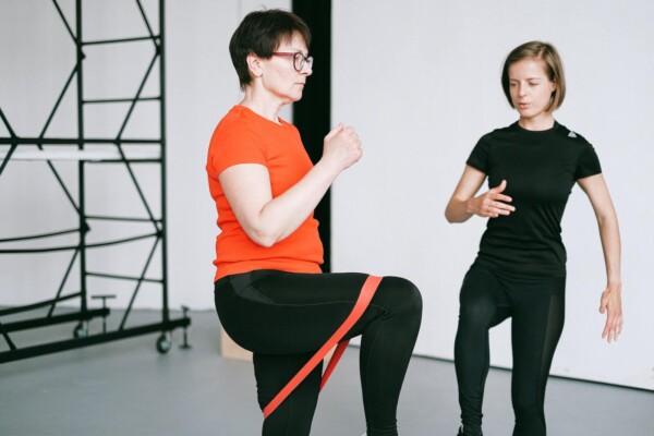 Woman Having Training Session at Gym
