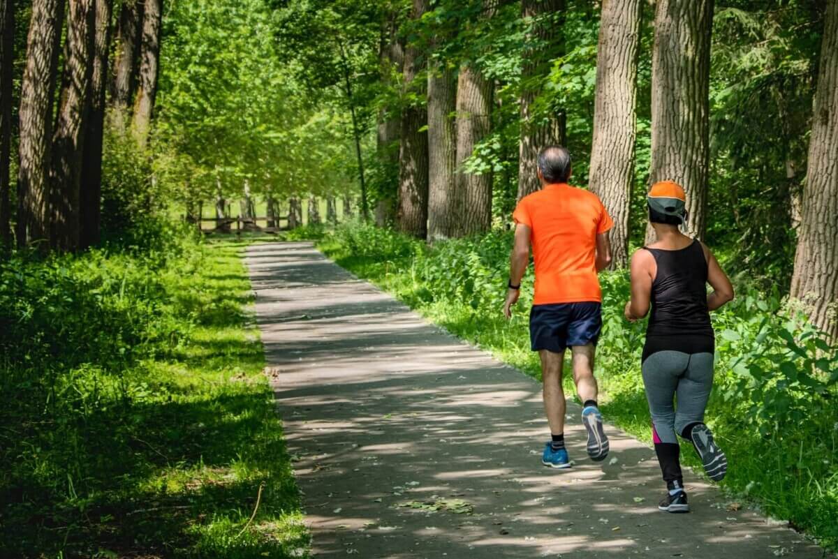 A couple jogging on a trail
