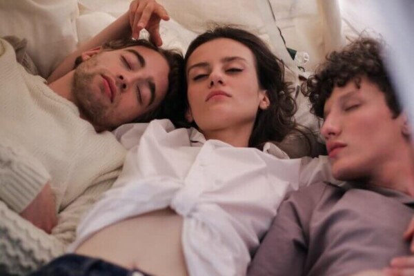 woman sleeping with 2 men