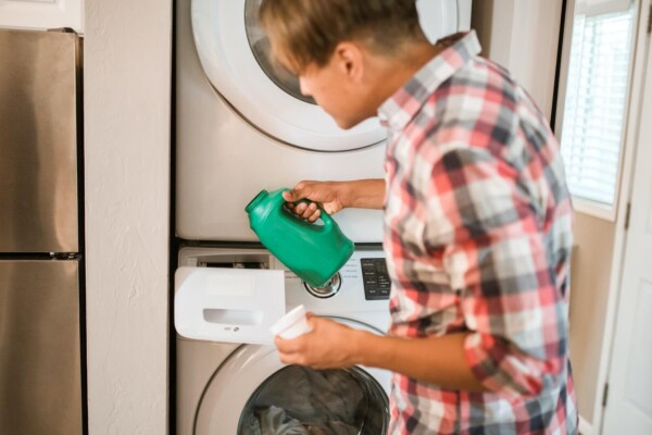Man Using a Washing Machine