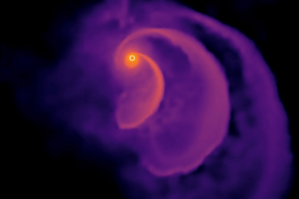 Black hole pulling in the remnants of a star.