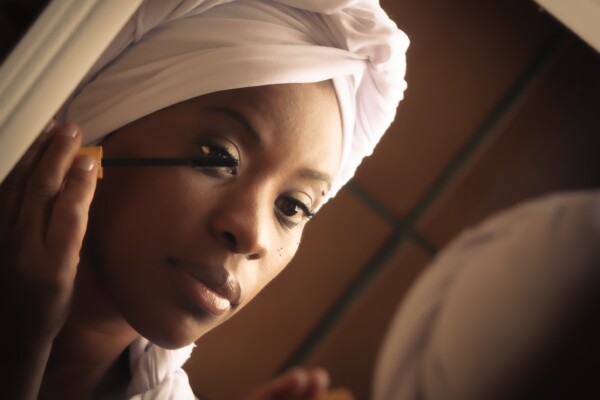 woman applying mascara