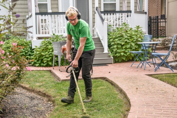 A man using a weed eater