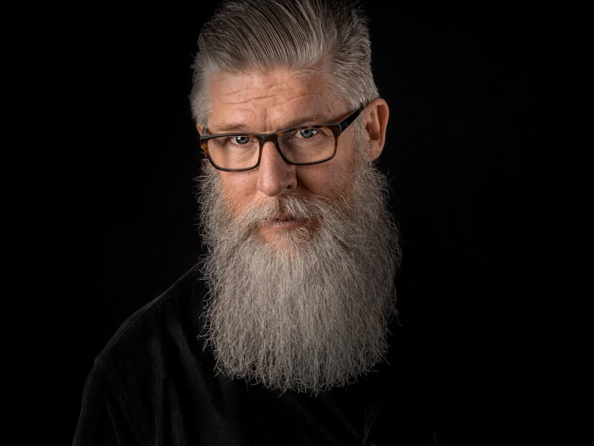 older man with gray hair and beard