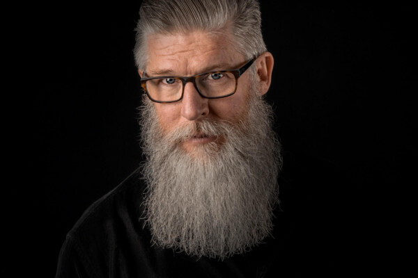 older man with gray hair and beard