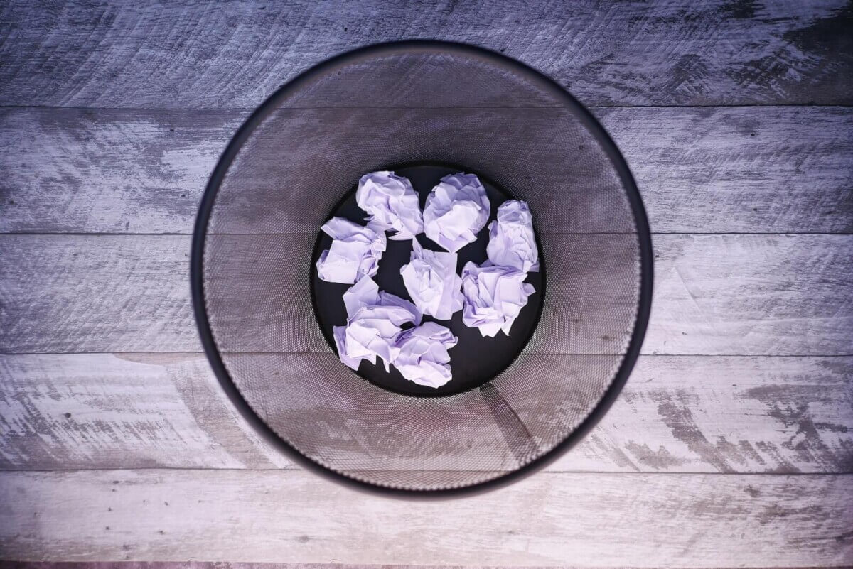 Paper in a trash can