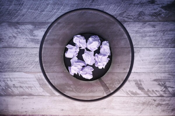 Paper in a trash can