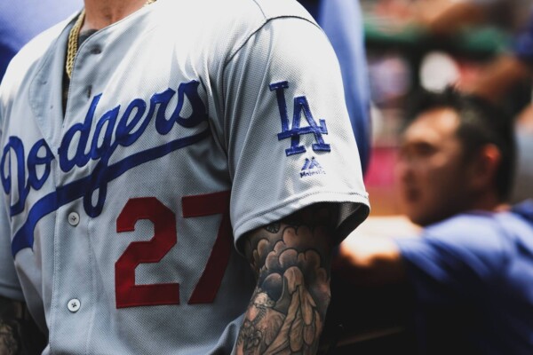 man wearing a Dodgers jersey