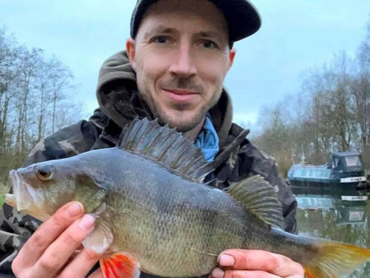 Andy Beeman holding fish