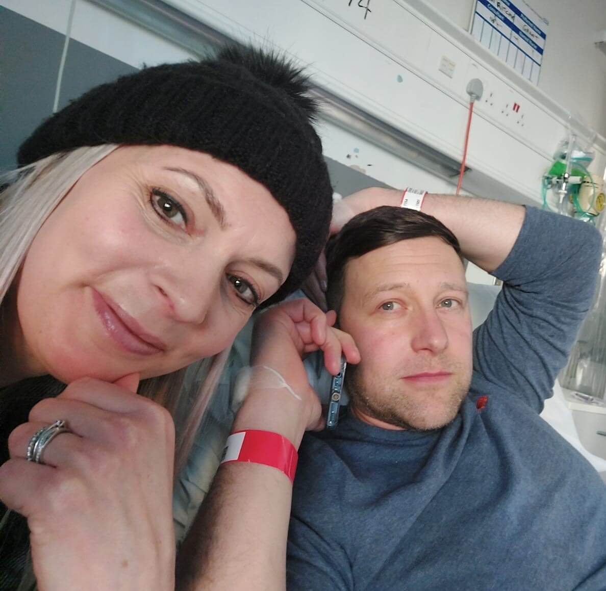 Grant Churnin-Ritchie in hospital with wife Hannah.