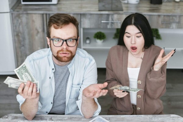 Man and women arguing over finances.