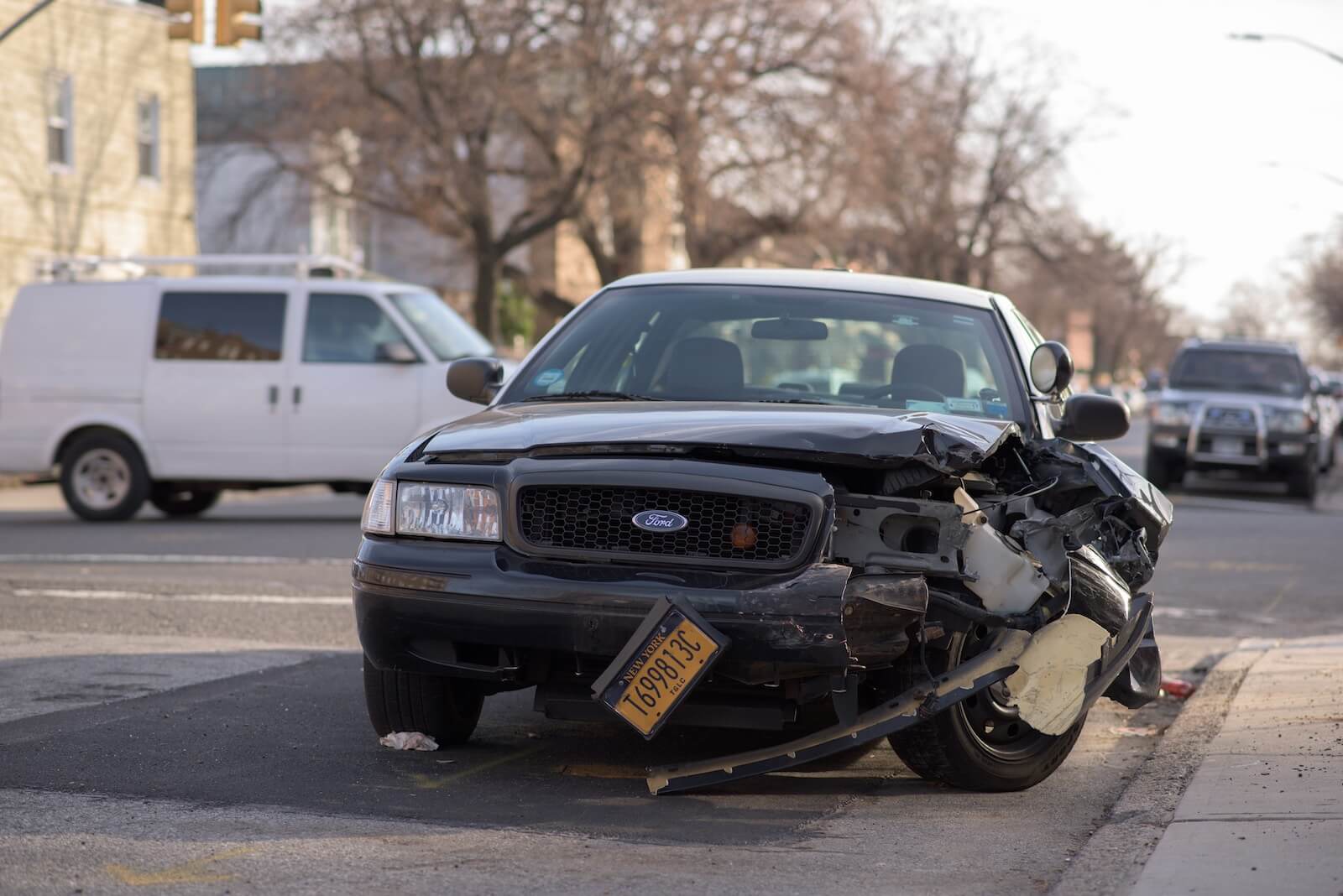 black car in an accident