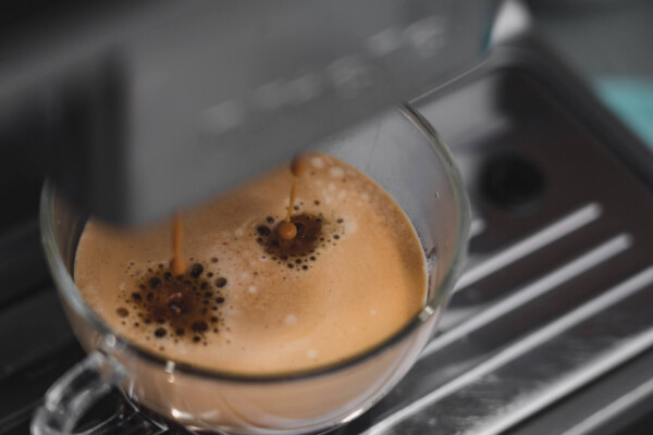 Coffee cup filling up under coffee maker