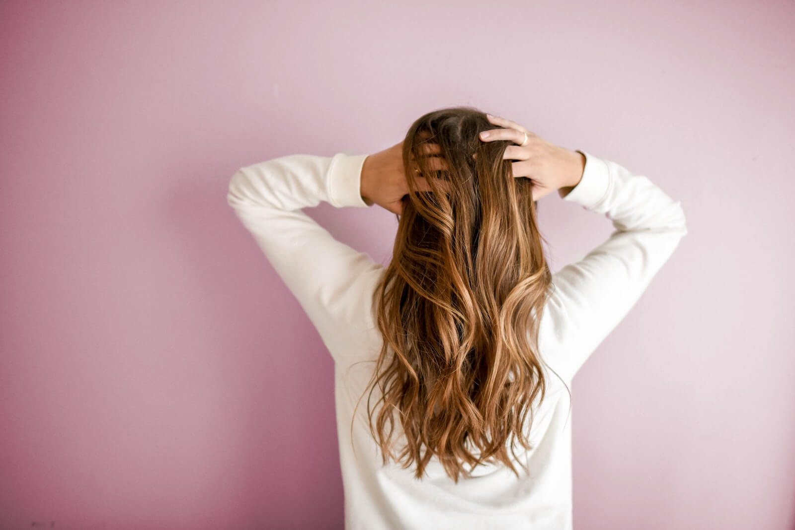 A woman with long hair extensions