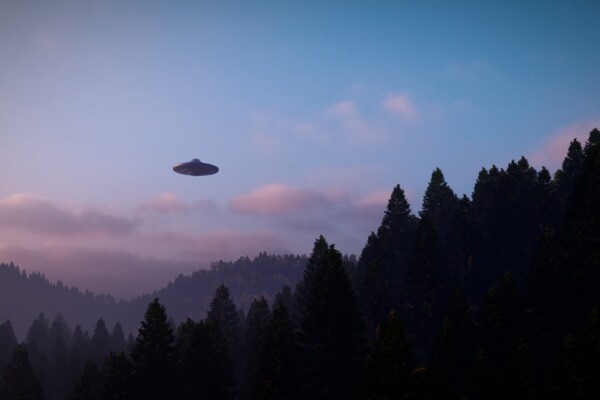 UFO hovering over the mountains
