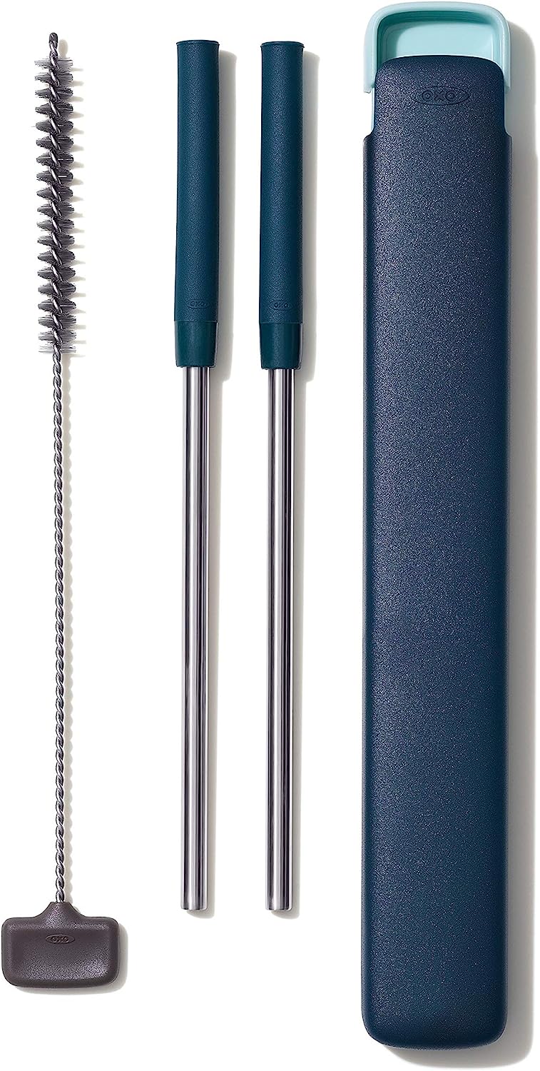 two navy blue straws with cleaner and case