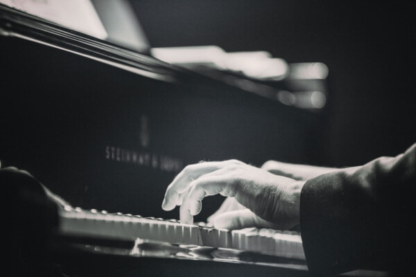 Someone playing piano
