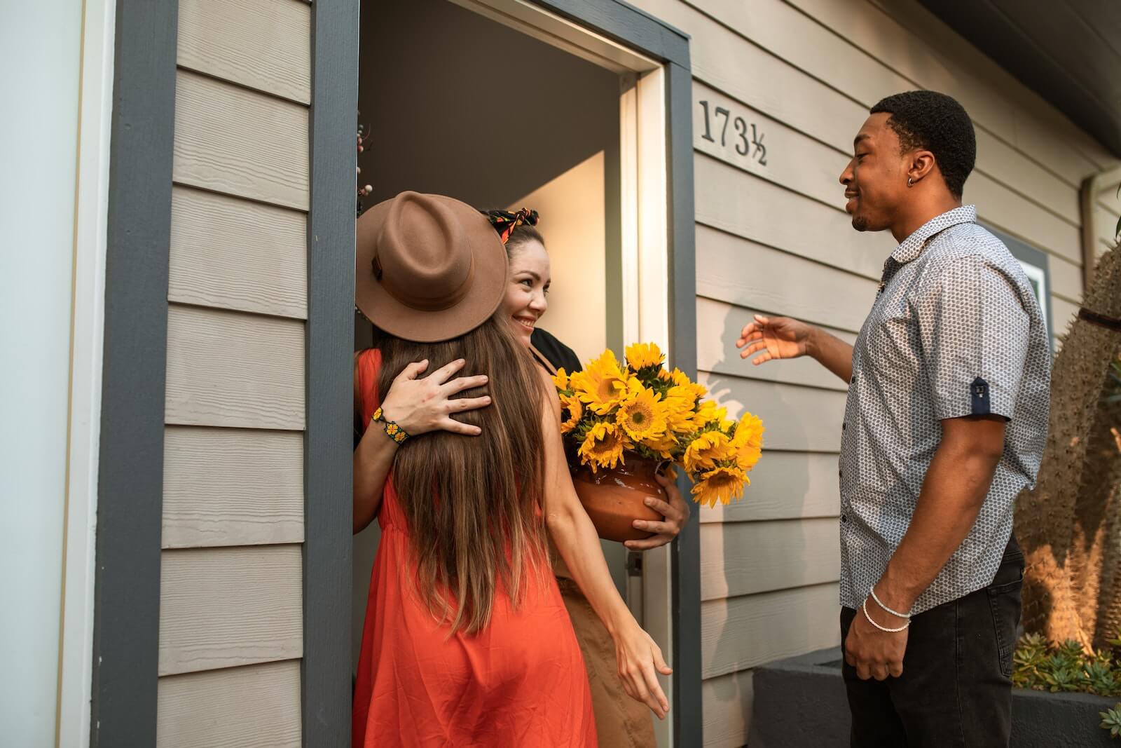 Greeting house guests at the front door