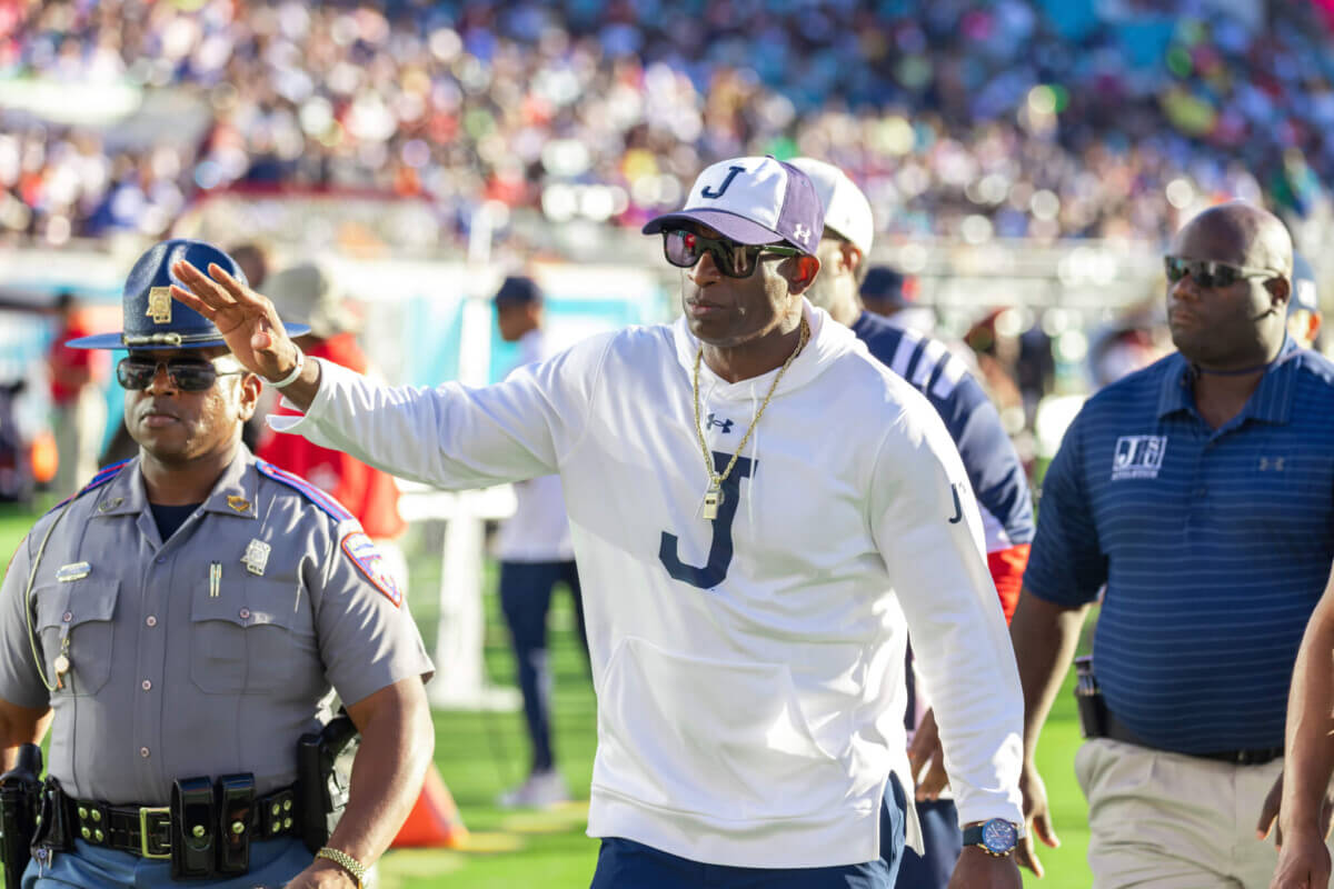 Deion Sanders waving to fans