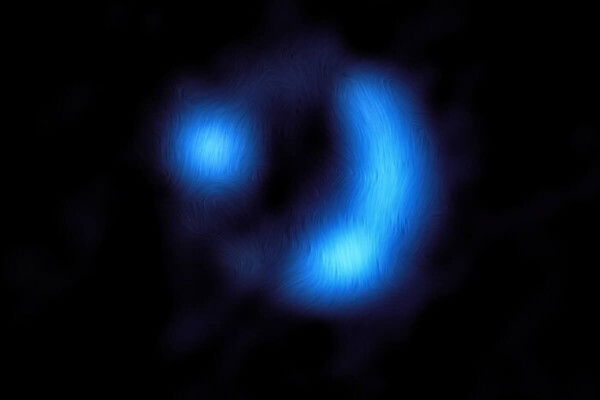 This image shows the orientation of the magnetic field in the distant 9io9 galaxy, it looks like a blue dot and a blue crescent moon