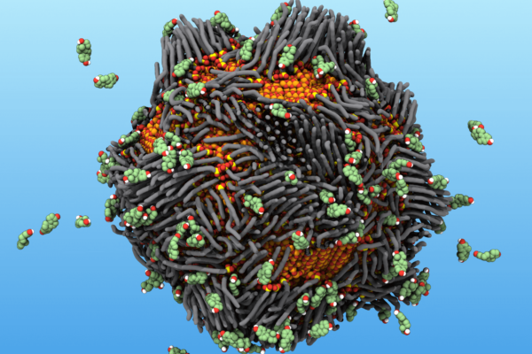 In this illustration, a “smart rust” nanoparticle attracts and traps estrogen molecules, which are represented by the floating objects.
