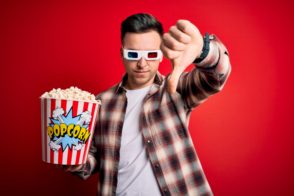 A movie fan giving a thumbs down